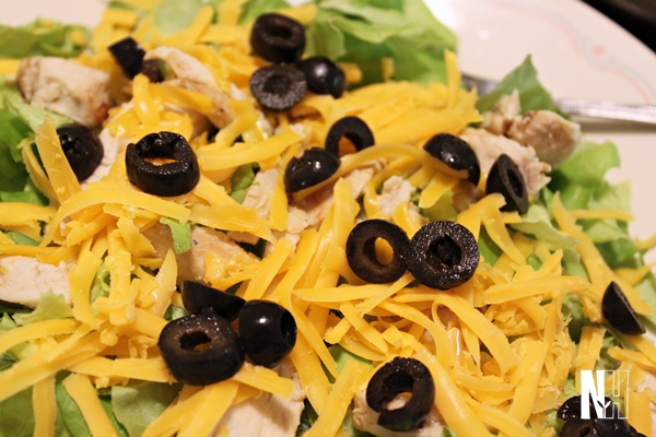 chicken, cheese, olives, & greens salad